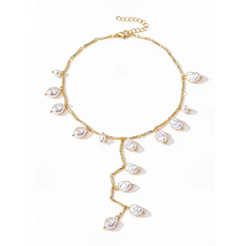 Mariselle Luxhers – Baroque Pearl Lariat Necklace flat lay